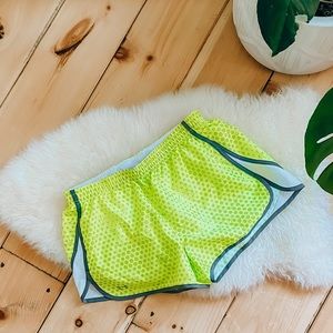 Under armour| neon running shorts.